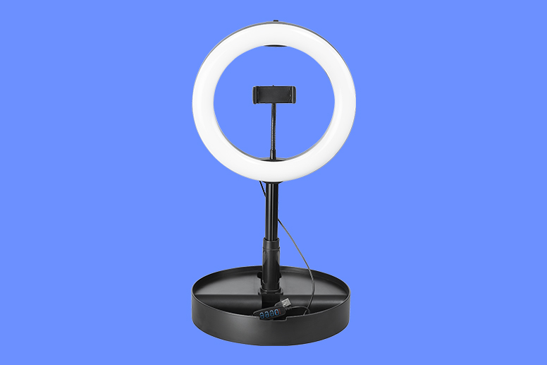 Phone tripod with a light
